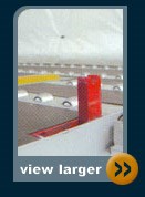 hydraroll powered roller for automatic trailer loading