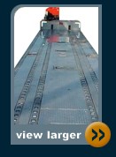 hydraroll flatbed with pneumatic roller track and generator for powered roller